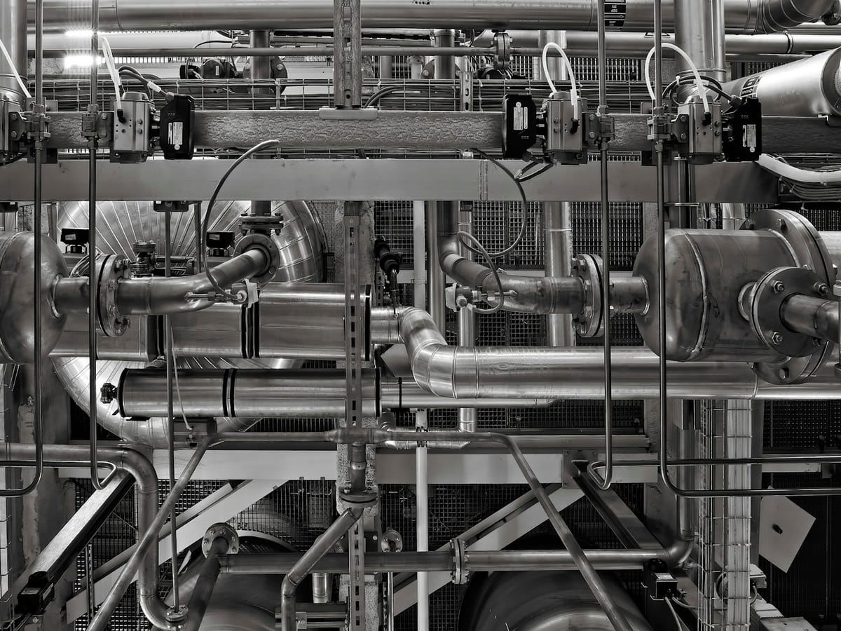 Industrial piping and valve systems in a manufacturing plant
